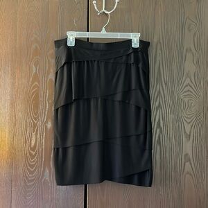 White House Black Market pull-on black ruffled skirt. Size Medium.